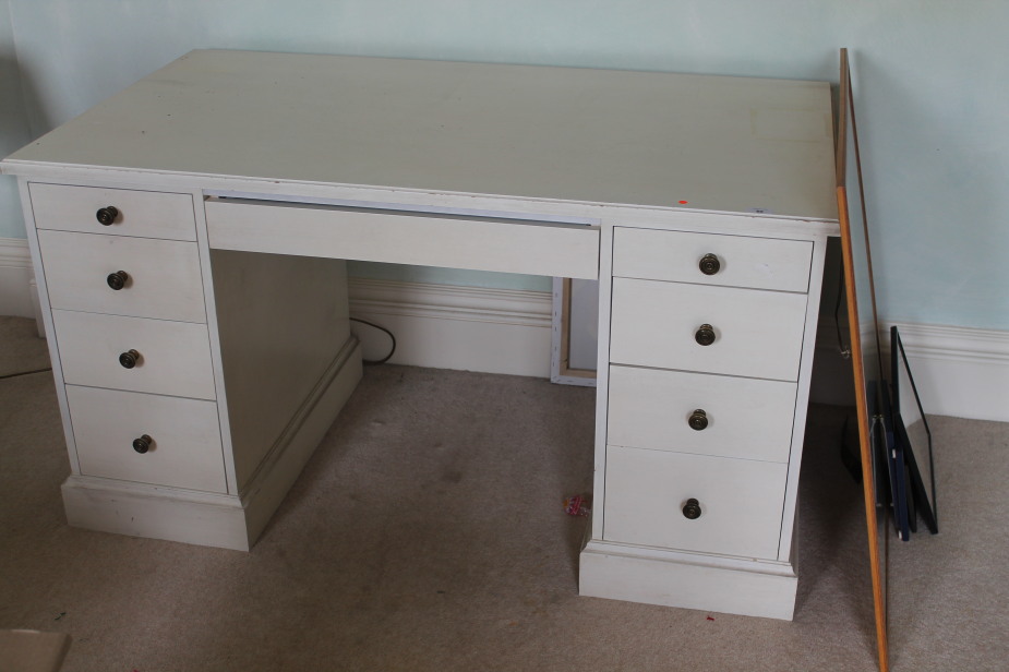 Appraisal: A white painted kneehole dressing table cm wide