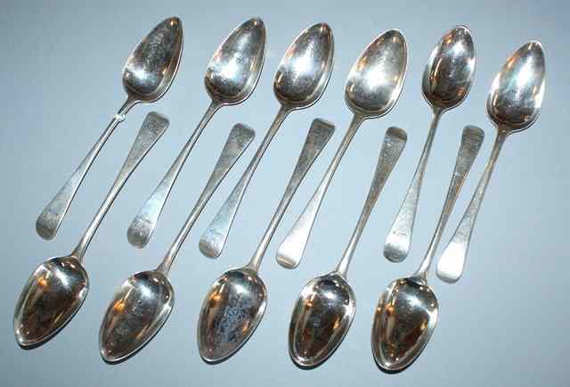 Appraisal: A COMPOSITE SET OF ELEVEN OLD ENGLISH PATTERN SILVER TABLESPOONS