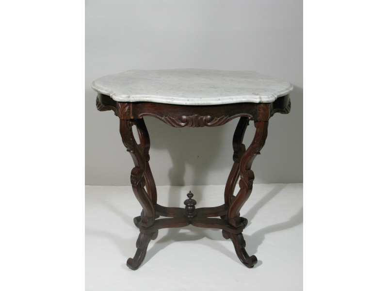 Appraisal: Victorian Marble Turtle Top Parlor Table having carved scroll and