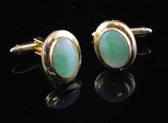 Appraisal: A pair of ct gold jadeite cufflinks of oval form