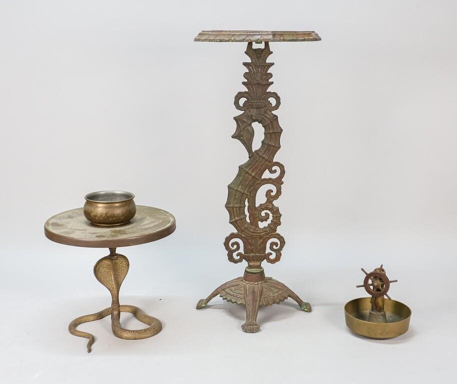 Appraisal: Patinated brass cobra stand with tray and bowl Iron nautical