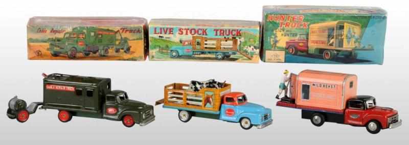 Appraisal: Lot of Tin Truck Friction Toys Description Japanese Working Includes