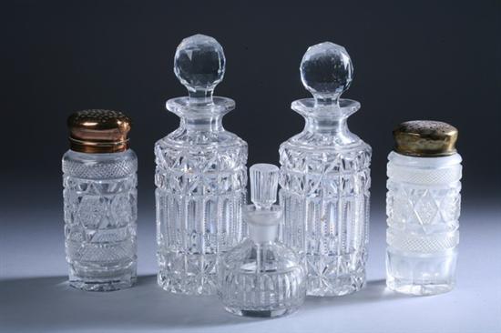 Appraisal: FIVE CRYSTAL BOTTLES Pair decanters with stoppers pair casters and