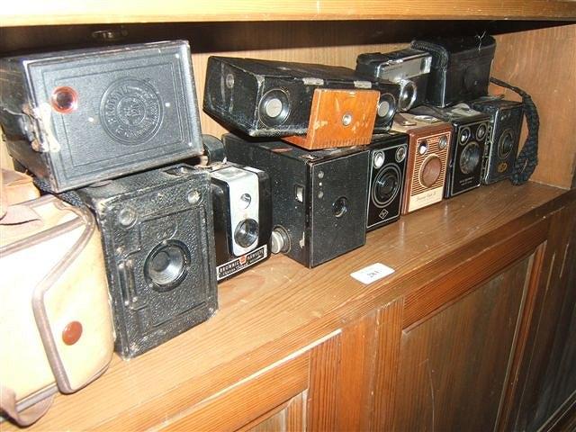 Appraisal: A GROUP OF BOX CAMERAS to include Kodak Brownie and