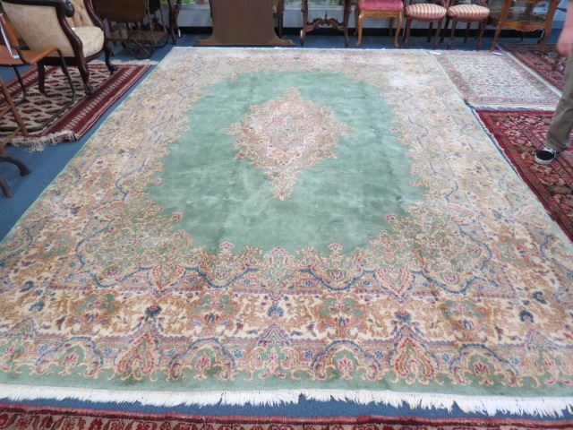 Appraisal: Kerman Persian Handmade Room Size Rug elegant central medallion and