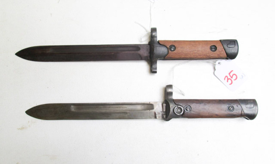 Appraisal: TWO ITALIAN MODEL BAYONETS the first a folding type plus