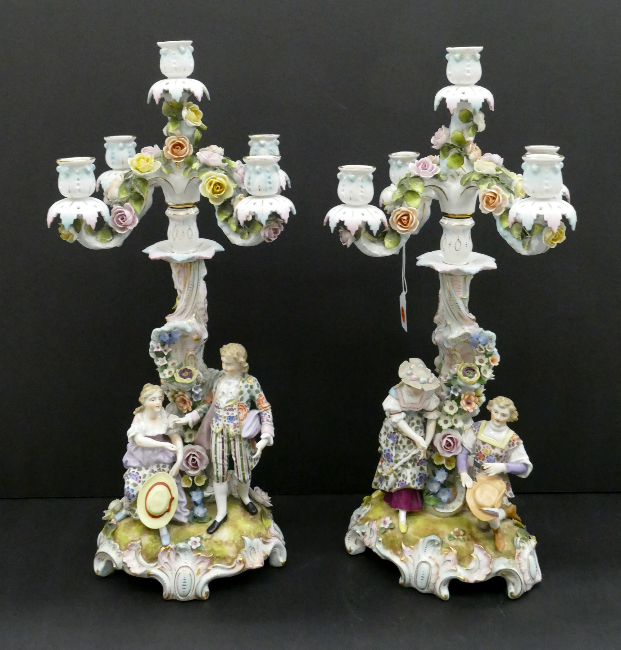 Appraisal: Pair German Handpainted Porcelain Rococo Candelabras likely Hochst Removable top