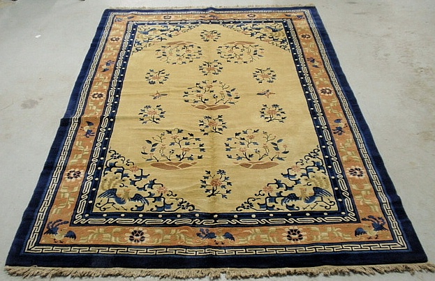 Appraisal: - Chinese Peking oriental carpet with a beige center blue