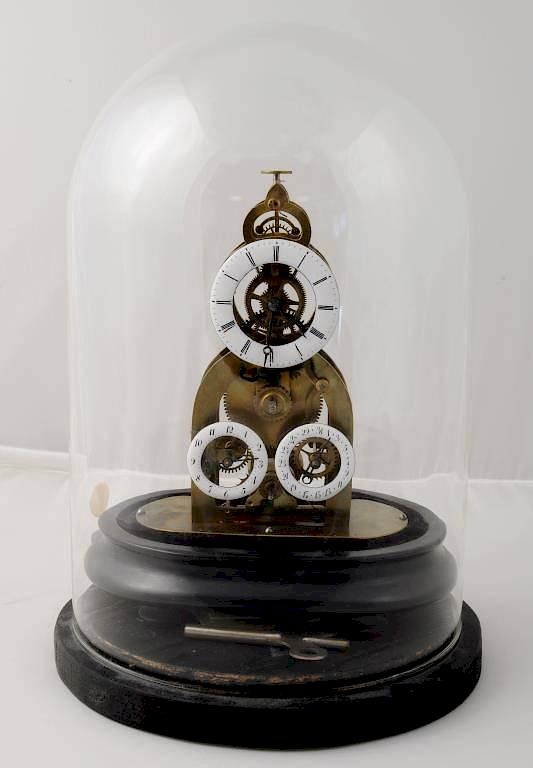 Appraisal: French Brass Enamel Column Skeleton Clock French brass and enamel