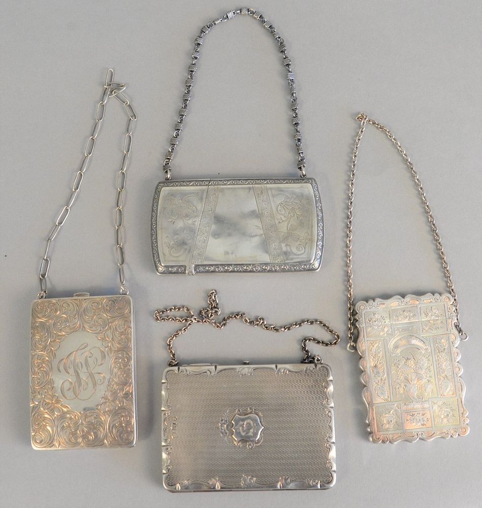 Appraisal: Four silver purses and card cases having chains largest ht