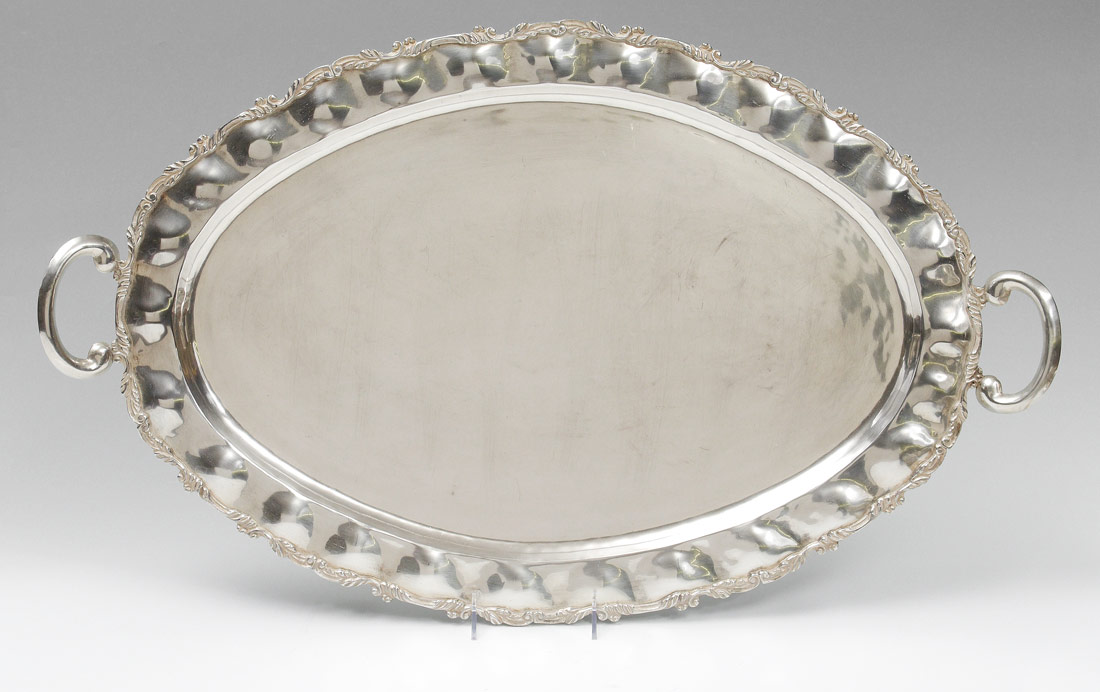 Appraisal: LARGE MEXICAN STERLING SILVER SERVING TRAY Embossed hammered rim with