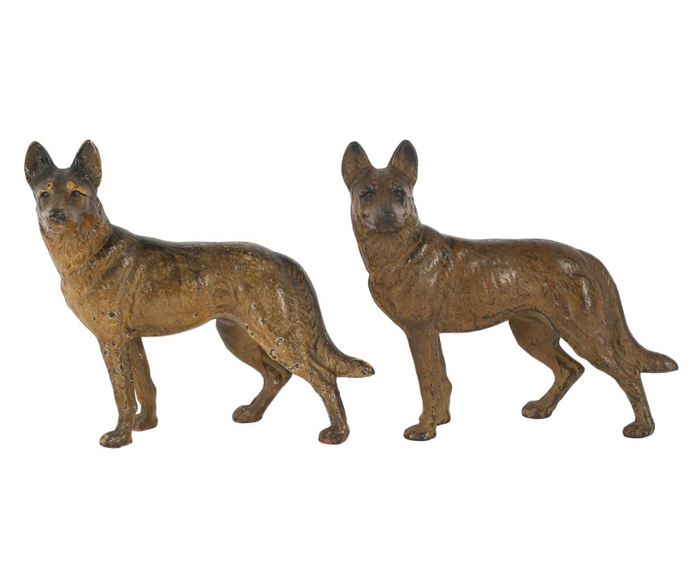 Appraisal: PAIR OF PAINTED IRON DOORSTOPSmodeled as German shepherds Condition paint