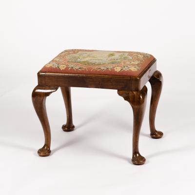 Appraisal: A walnut dressing stool of Queen Anne design fitted a