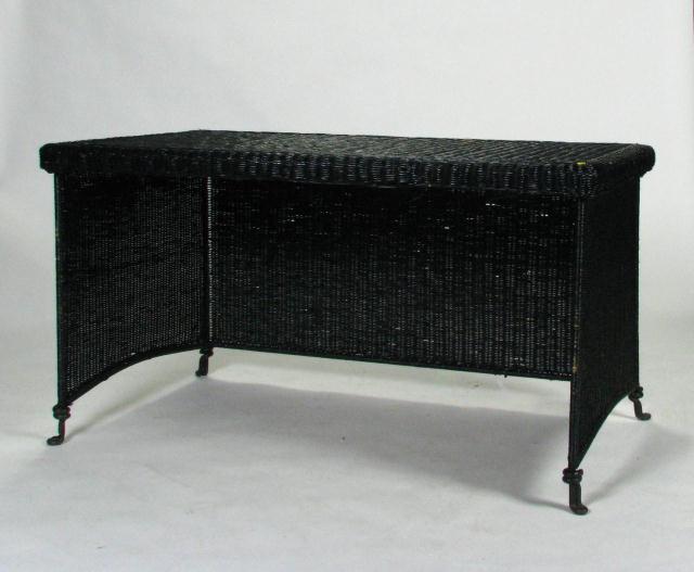 Appraisal: Vintage wicker writing desk x black painted finish cast metal