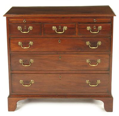 Appraisal: A late George III mahogany chest the moulded edge top