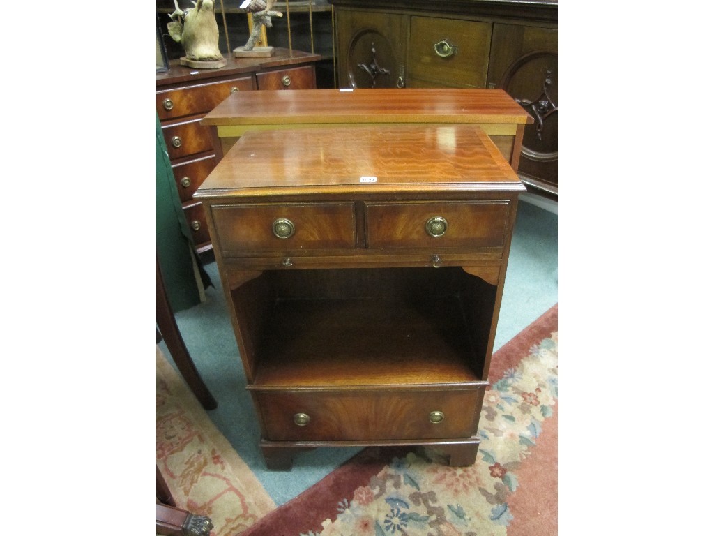 Appraisal: Reproduction open bookcase with drawers and a reproduction regency style