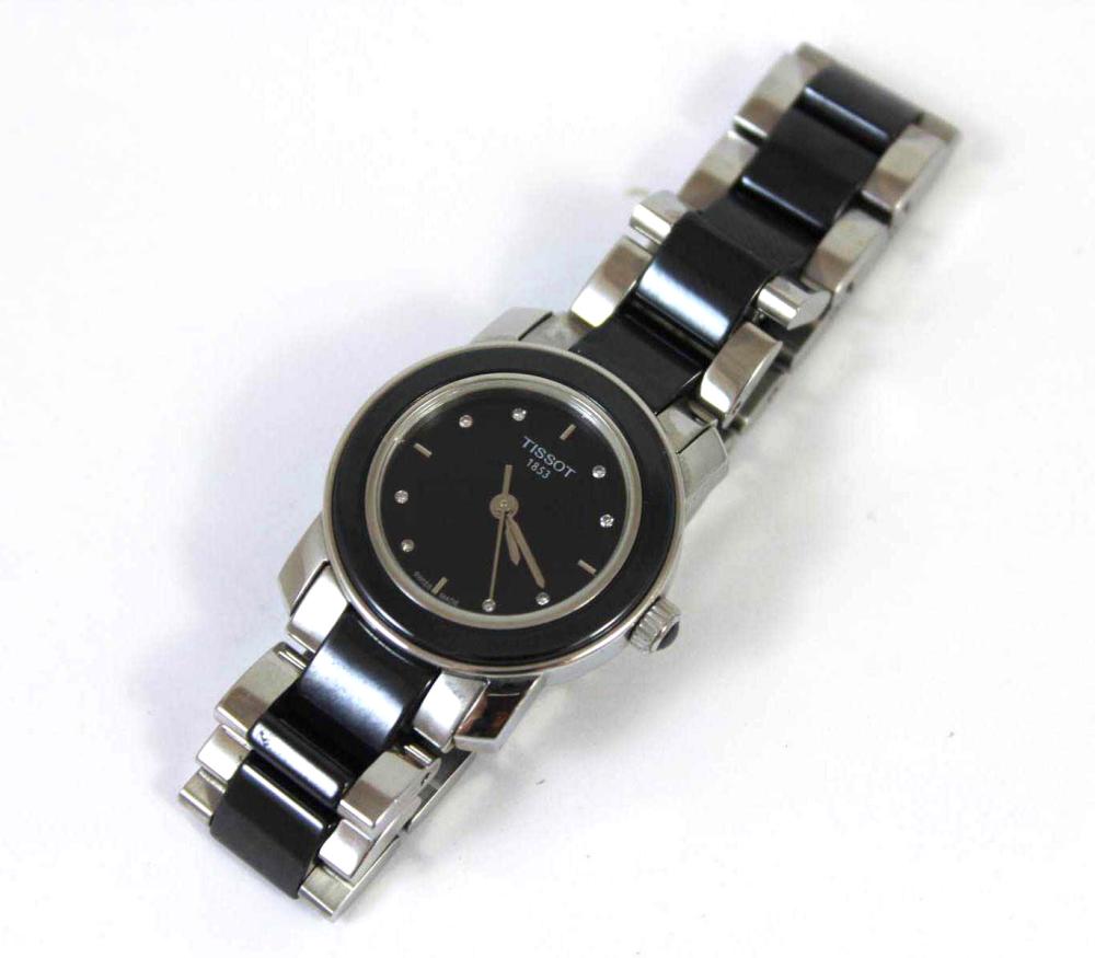 Appraisal: LADIES WATCH BY TISSOT the black and silvertone watch having