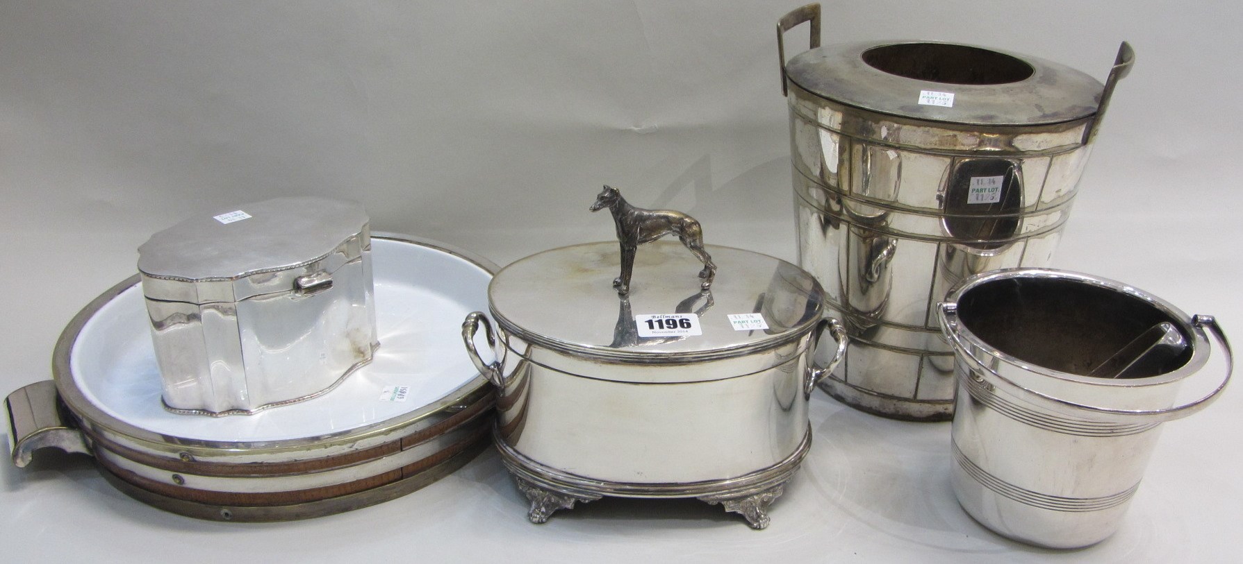 Appraisal: A plated oval hinge lidded biscuit box the handle to