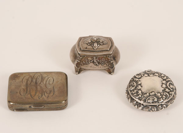 Appraisal: Sterling silver pill box miniature casket and repousse locket The