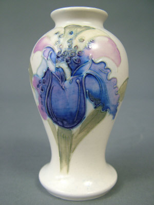 Appraisal: A Moorcroft 'Frilled and Slipper Orchids' salt glazed miniature vase