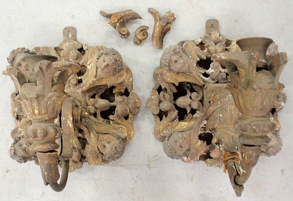 Appraisal: - Pair of putti carved Italian wall sconces th th