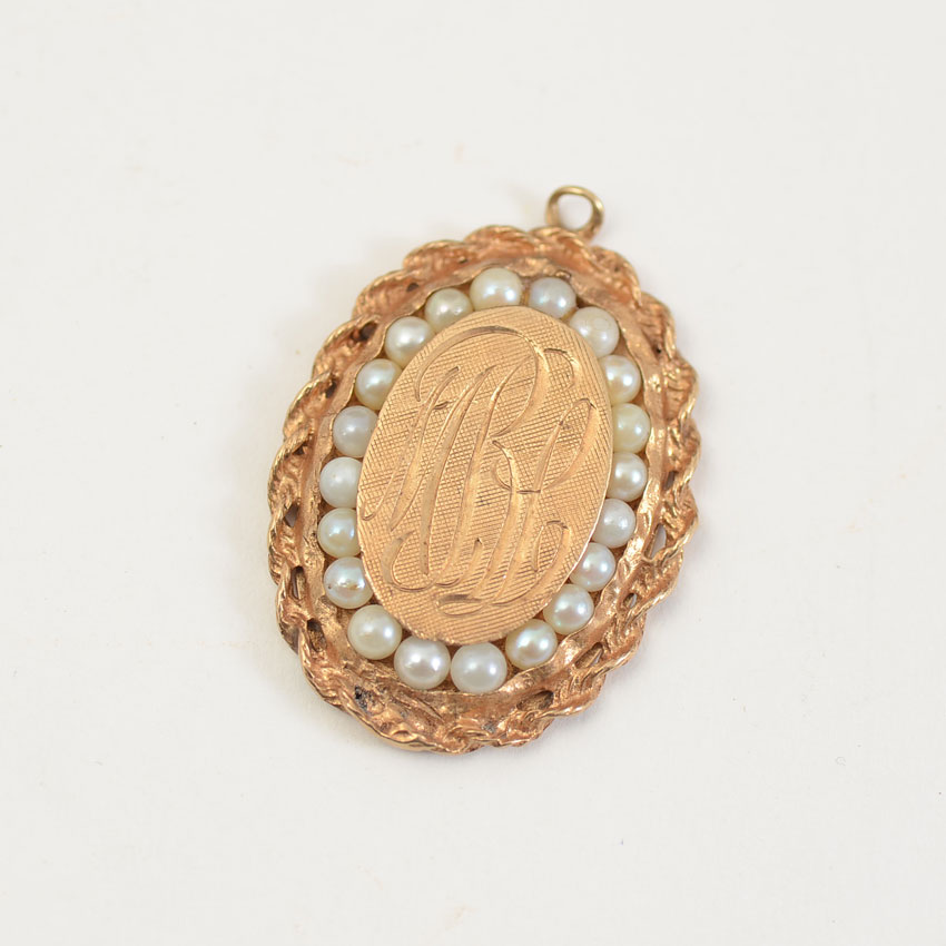 Appraisal: ANTIQUE K OVAL PENDANT WITH SEED PEARLS Sweet pendant with