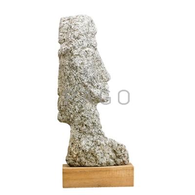 Appraisal: EDWIN SCHEIER - Stone sculpture with faces on wooden base