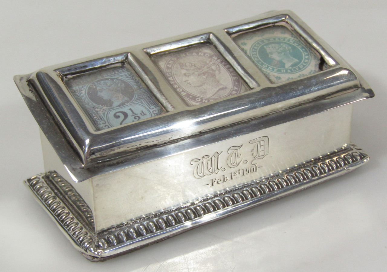 Appraisal: A late Victorian silver stamp case of three sectional outline