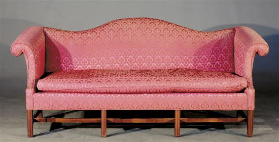 Appraisal: Chippendale style mahogany and upholstered sofa th centuryserpentine back extending