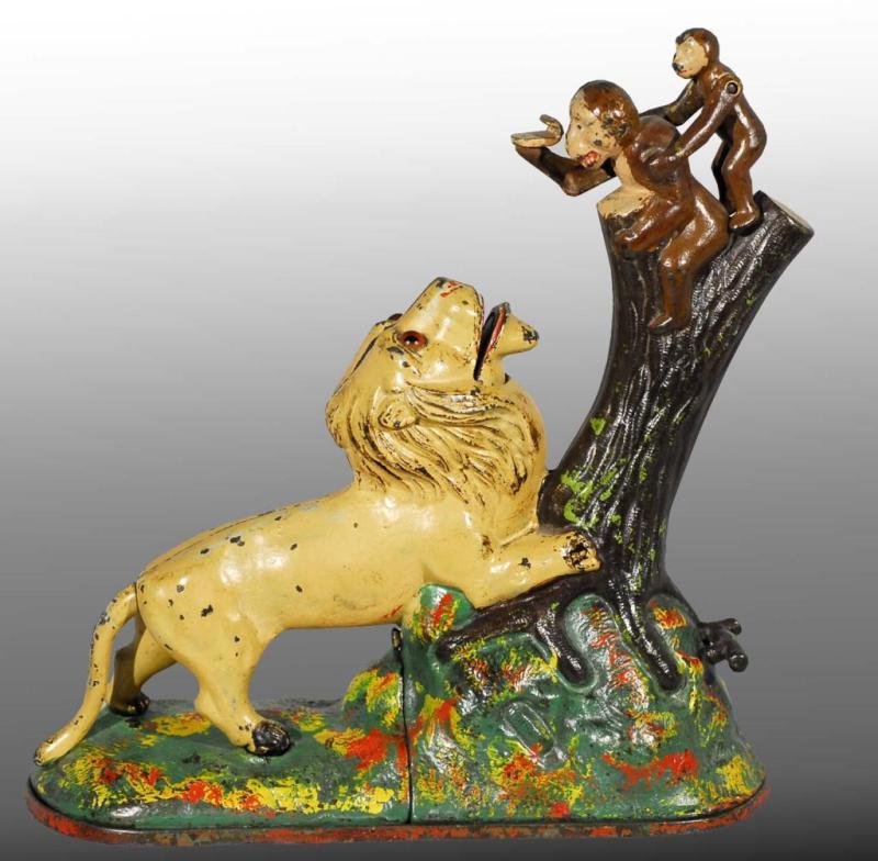 Appraisal: Cast Iron Lion Monkeys Mechanical Bank Description Manufactured by Kyser