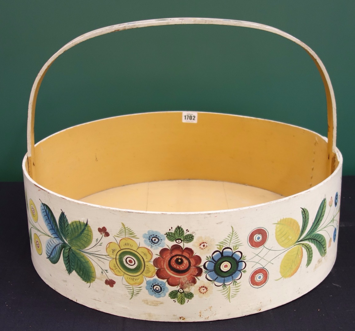 Appraisal: A large floral painted circular trug with loop handle cm