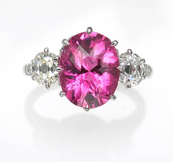 Appraisal: A pink tourmaline and diamond ring centering an oval-shaped tourmaline