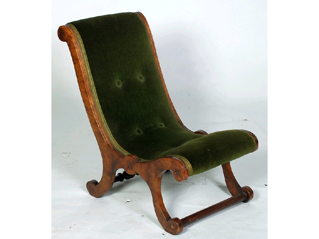 Appraisal: VICTORIAN CAVED WALNUT NURSING CHAIR with buttoned green upholstery and