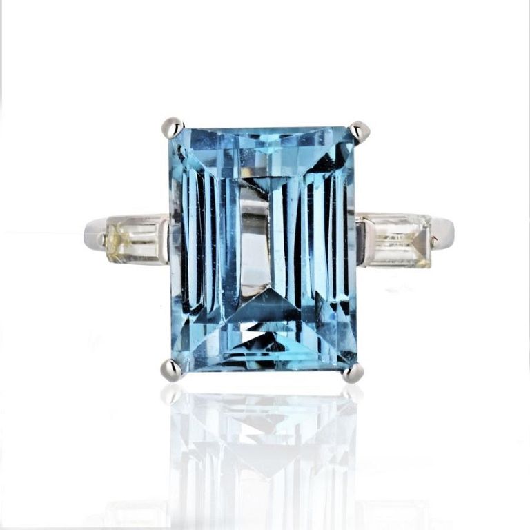 Appraisal: PLATINUM CARAT AQUAMARINE AND DIAMOND RING Three stone Aquamarine and