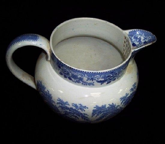 Appraisal: A mid th Century Staffordshire blue and white punch jug