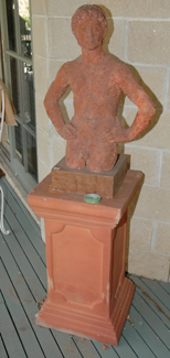 Appraisal: A HAND BUILT EARTHENWARE TORSO OF A MALE Raised on