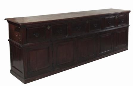 Appraisal: A Georgian oak sideboard the moulded rectangular top over three