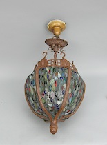 Appraisal: A Bronze and Leaded Pendant Shade Reproduction The bronze frame