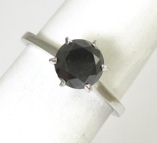 Appraisal: BLACK DIAMOND SOLITAIRE RING k white gold with six gold