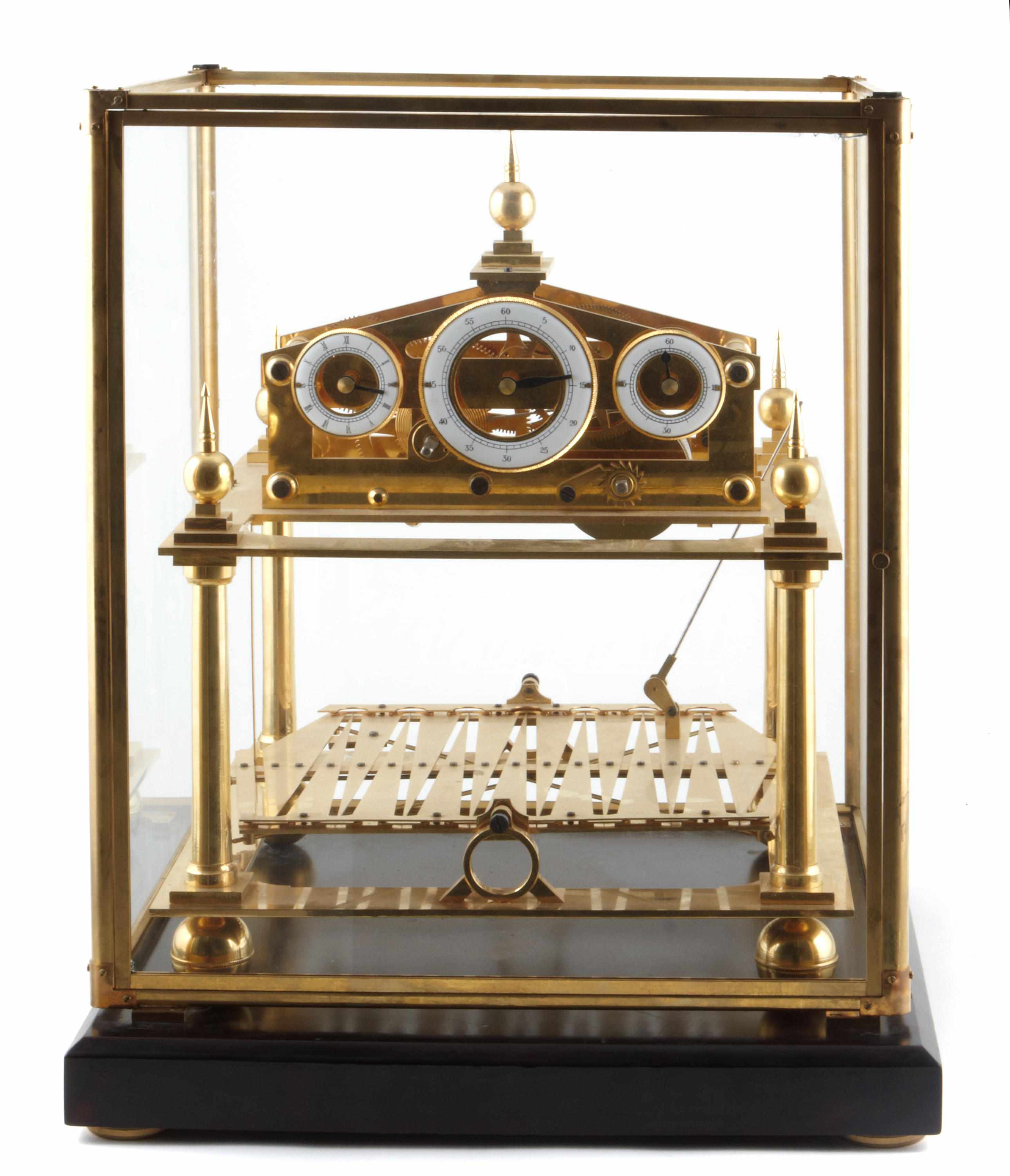 Appraisal: Property of various owners An oscillating path rolling ball clock