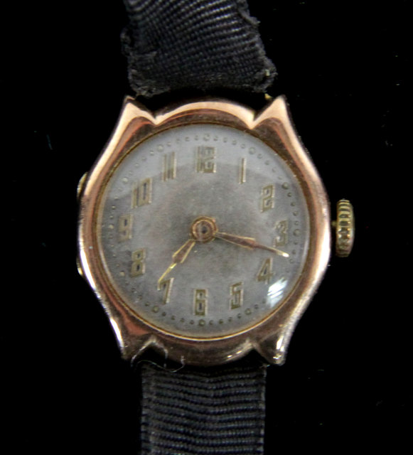 Appraisal: A ct gold wristwatch the case numbered fitted a jewel