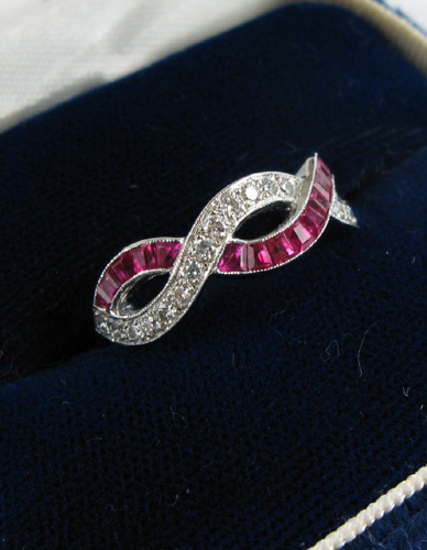 Appraisal: RUBY DIAMOND AND EIGHTEEN KARAT WHITE GOLD RING set with