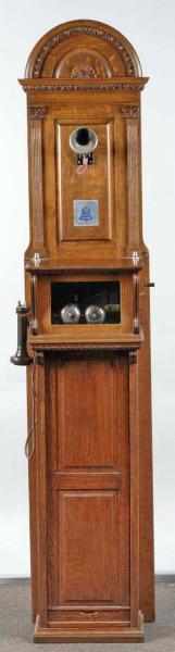 Appraisal: Western Electric Magneto Wall Cabinet Set Description Circa Oak floor