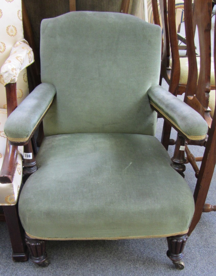 Appraisal: A William IV mahogany open arm easy chair on tapering