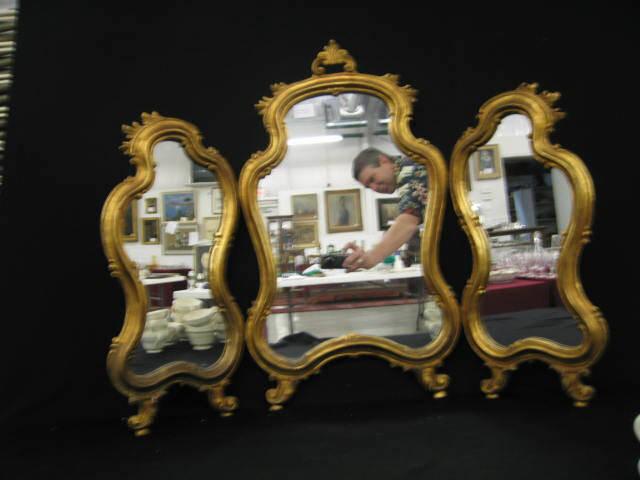 Appraisal: Italian Carved Wooden Dressing Mirror tri-fold gold finish tall open