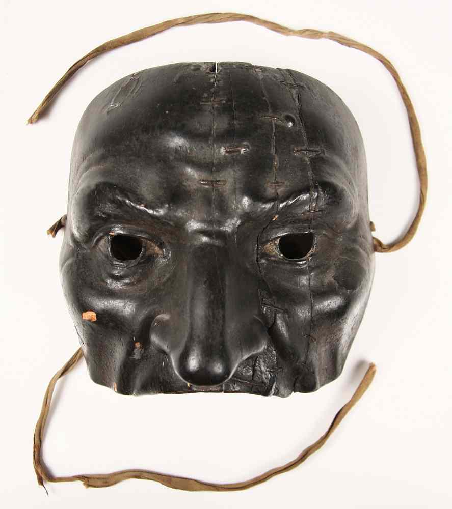 Appraisal: CARVED AND PAINTED COMMEDIA DELL'ARTE MASK OF PULCINELLA - This