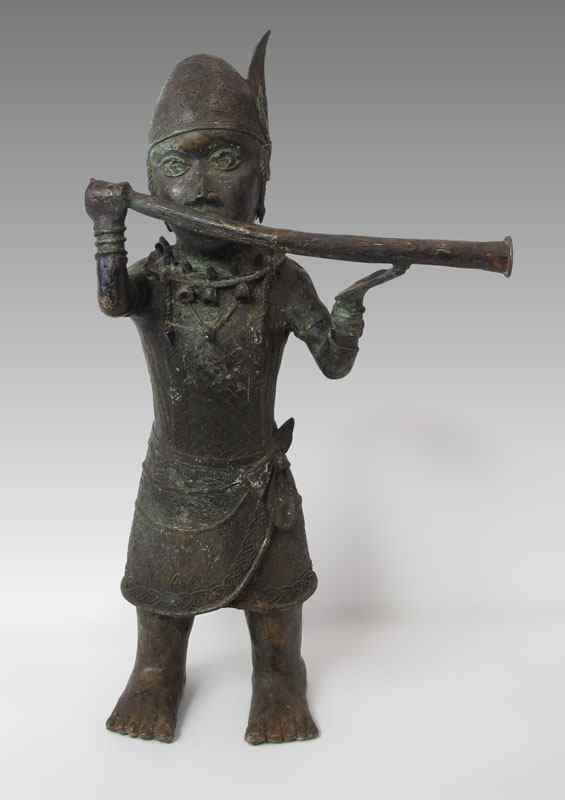 Appraisal: BENIN AFRICAN FIGURE WITH FLUTE INSTRUMENT SCULPTURE ' h x