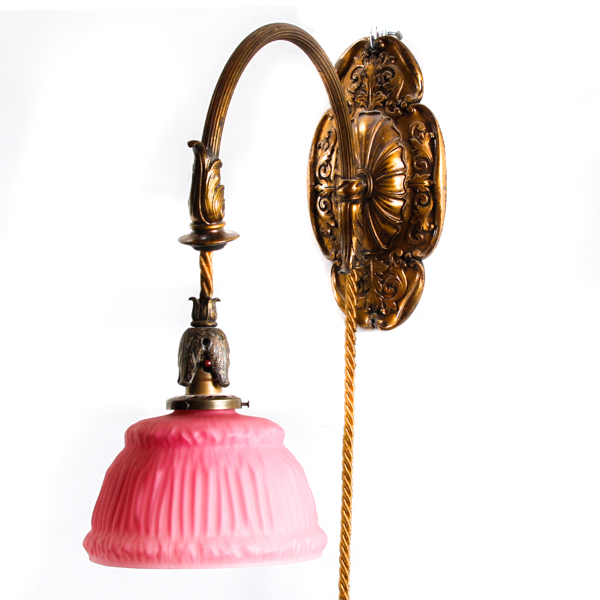 Appraisal: Gilt bronze wall hanging light sconce with molded drape design