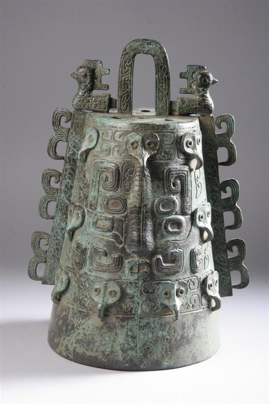 Appraisal: CHINESE ARCHAISTIC BRONZE BELL Cast with taotie mask decoration -