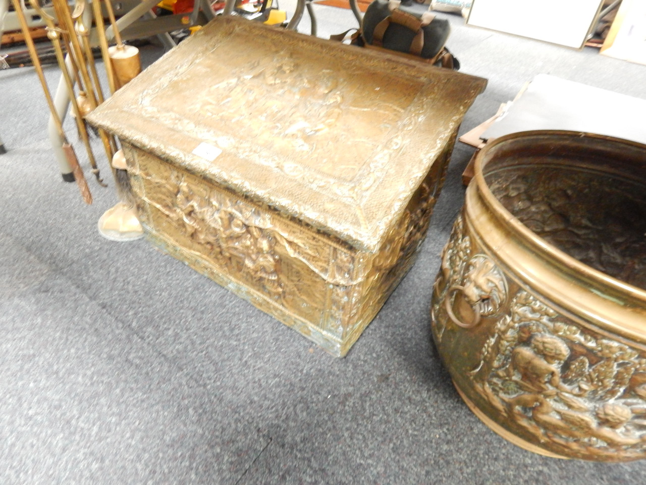 Appraisal: Brass fireside items including companion set embossed log box and